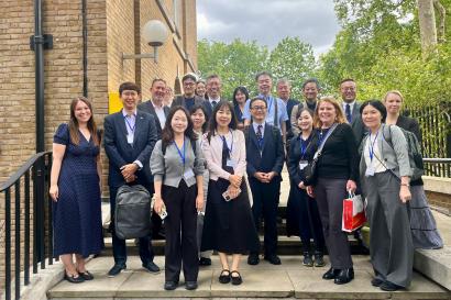 Group of higher-ed professionals outside of the IES Abroad London Center.