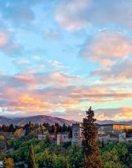 Granada hilltops and skies before sunset