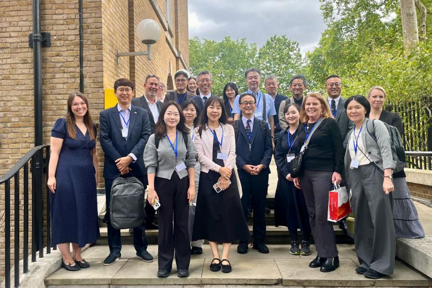 Group of higher-ed professionals outside of the IES Abroad London Center.