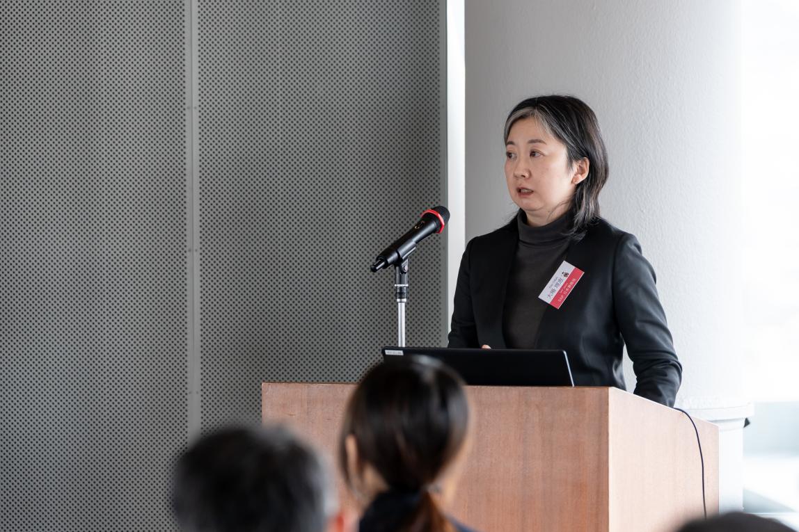 Rie Ooba giving a report at the SAF Annual Meeting