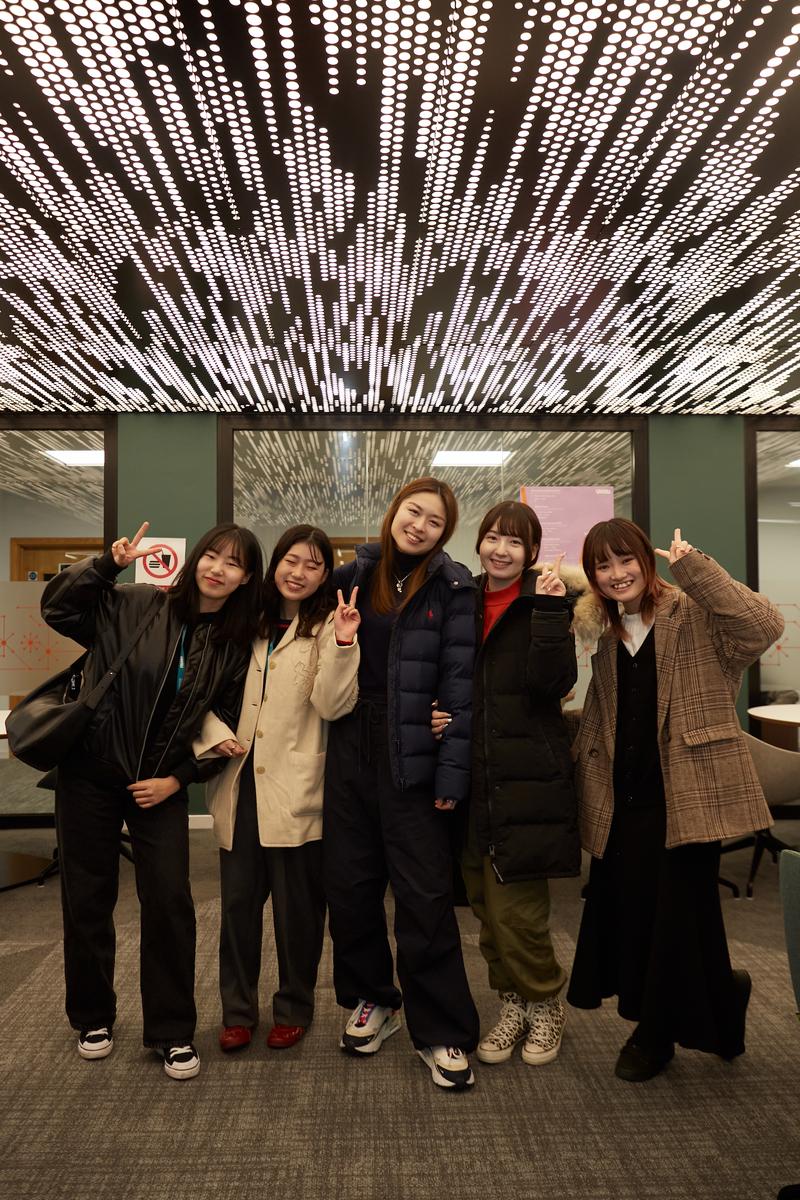 A group photo of five female SAF students at the University of Westminster.
