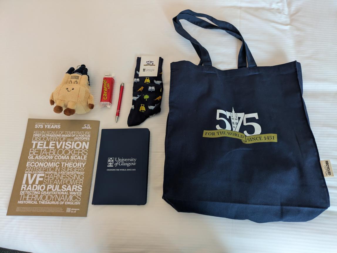 Various merch and swag from the University of Glasgow.