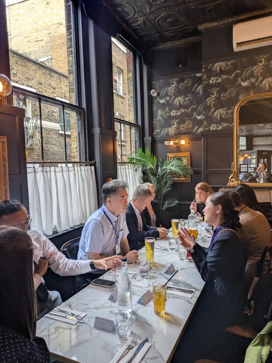 Professionals having lunch at The Clerk & Well in London.