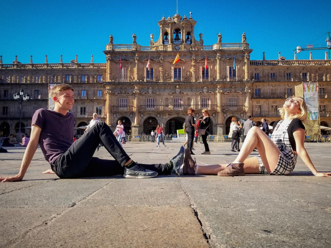 students posing for a fun photo in front of Plaza Mayor in Salamanca