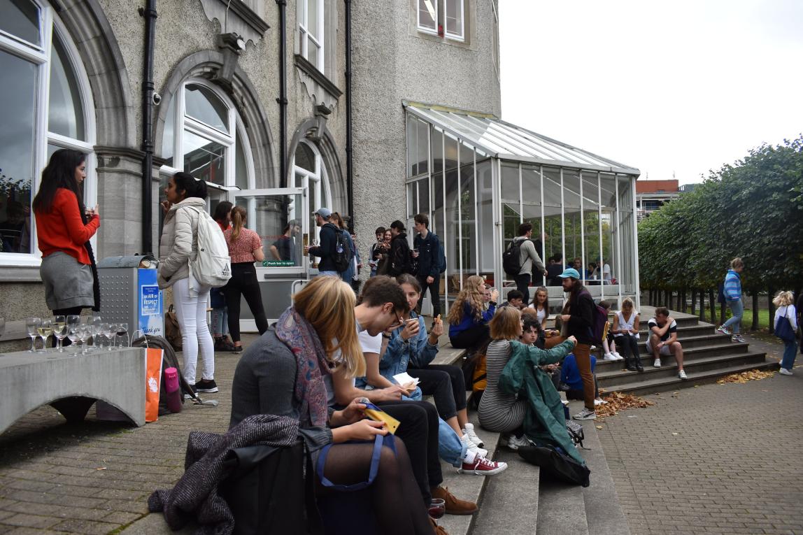 dublin students sitting outside the architecture building at University College Dublin