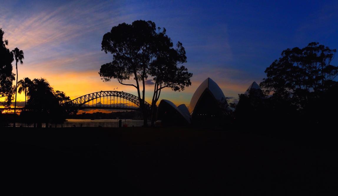 view of the Sydney opera house at sunset