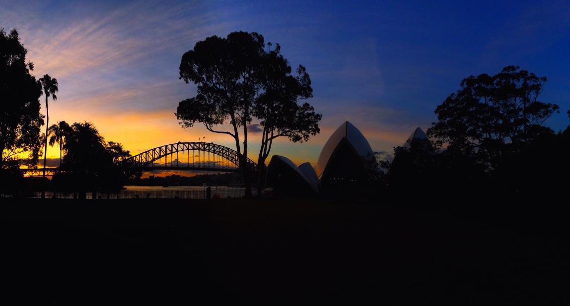 view of the Sydney opera house at sunset