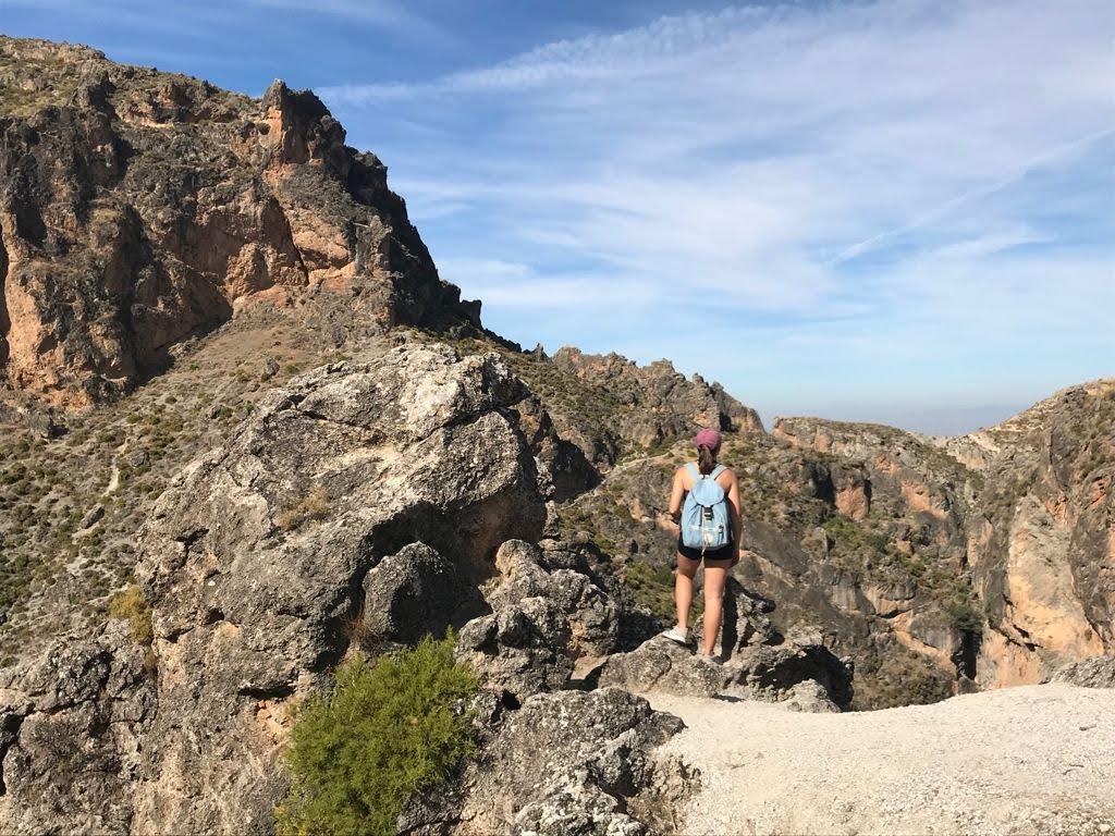 Student hiking in warm weather