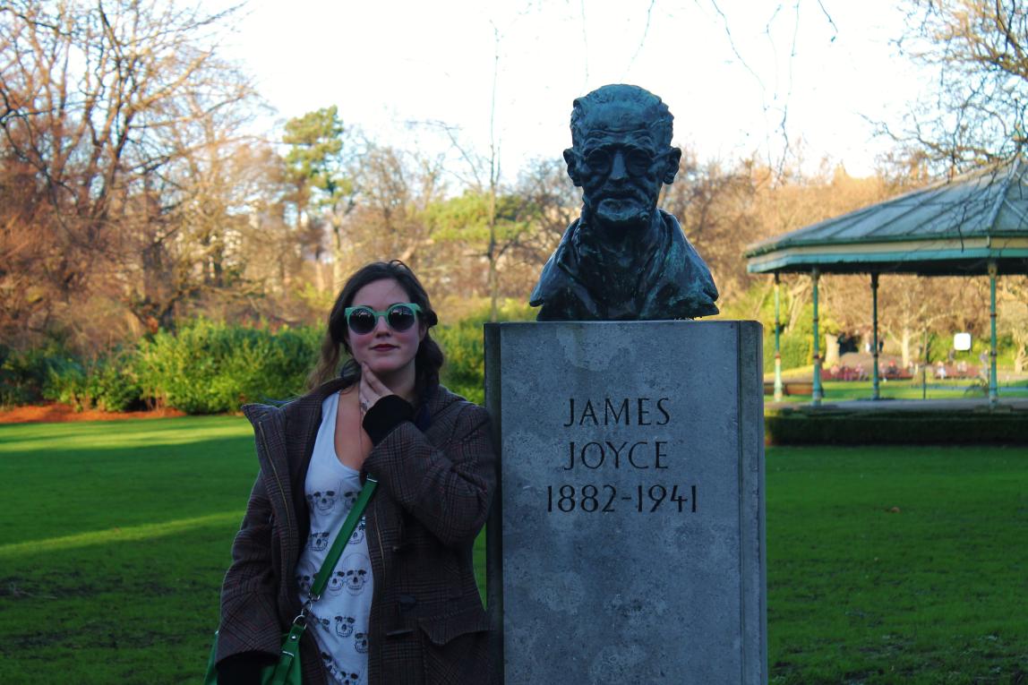 A student posing with a James Joyce statue in Dublin