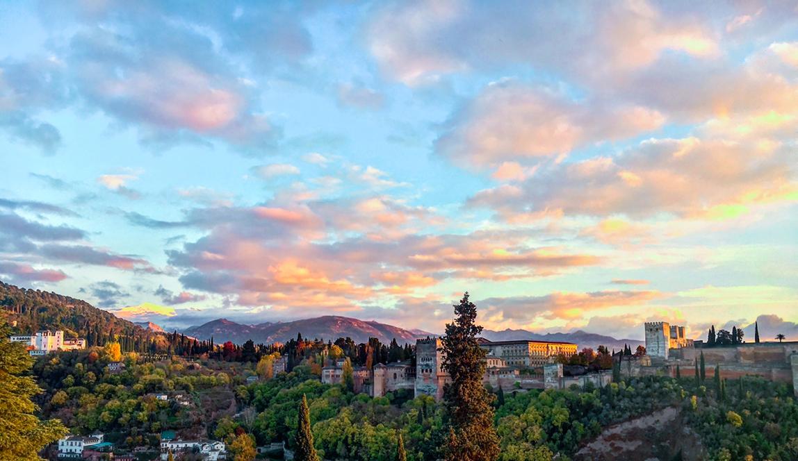 Granada hilltops and skies before sunset