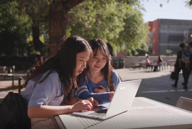 University of California Los Angeles UCLA Students on Campus using a Laptop