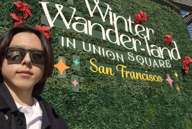 SAF Korea Kijung Park at sign for Winter Wanderland in Union Square, San Francisco