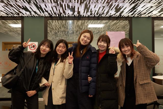 A group photo of five female SAF students at the University of Westminster.