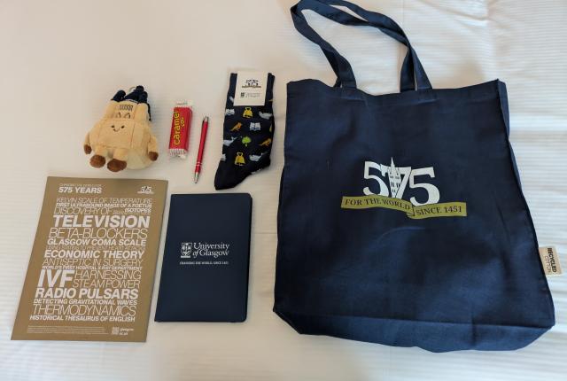 Various merch and swag from the University of Glasgow.