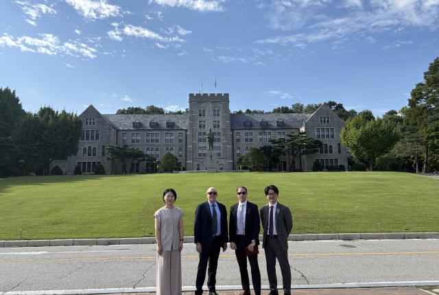 Dr. Greg Hess with IES Global Seoul staff and a university partner.