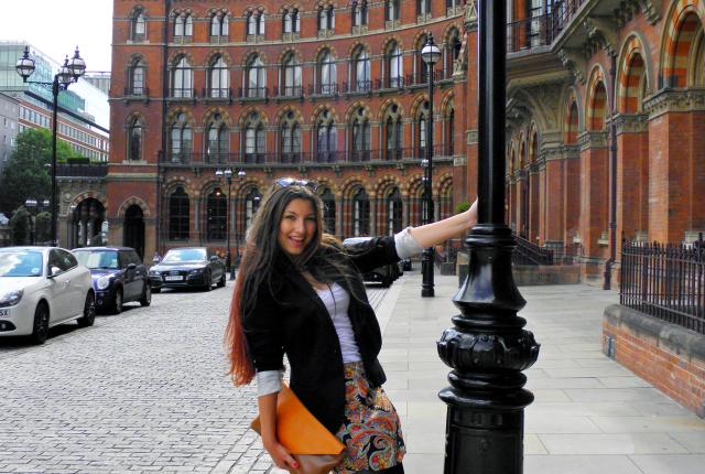 a student intern poses for a photo outside of King's Cross in London