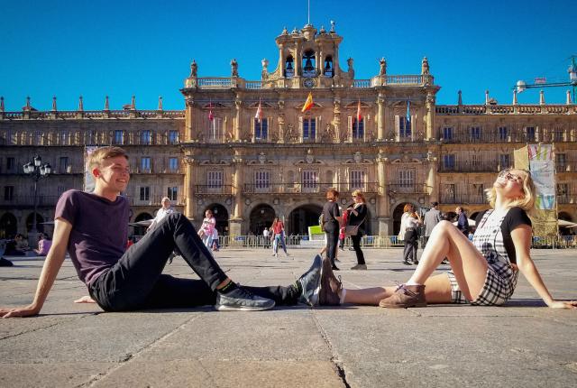 students posing for a fun photo in front of Plaza Mayor in Salamanca