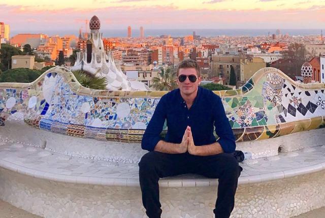 a male student poses for a photo at Park Güell