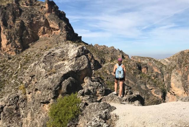 Student hiking in warm weather