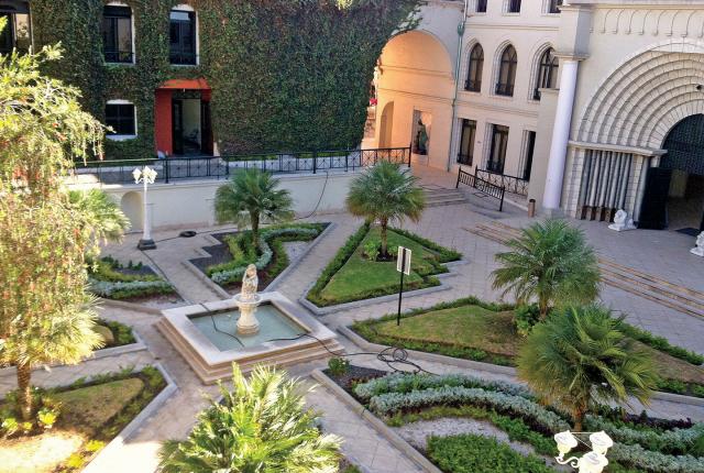Universidad San Francisco de Quito's beautiful outdoor gardens with a fountain centerpiece.
