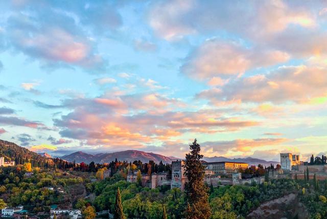 Granada hilltops and skies before sunset