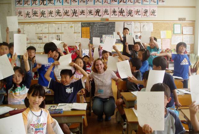 a Tokyo student in an elementary school with students for their field placement