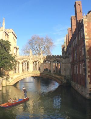 people punting on the Cam River in Cambridge