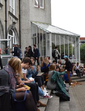 dublin students sitting outside the architecture building at University College Dublin