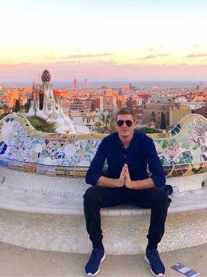 a male student poses for a photo at Park Güell