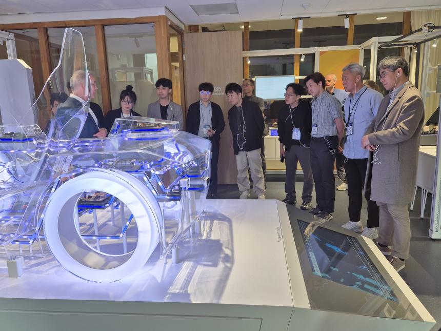 A group of Korean semiconductor professionals tour a facility in the Netherlands