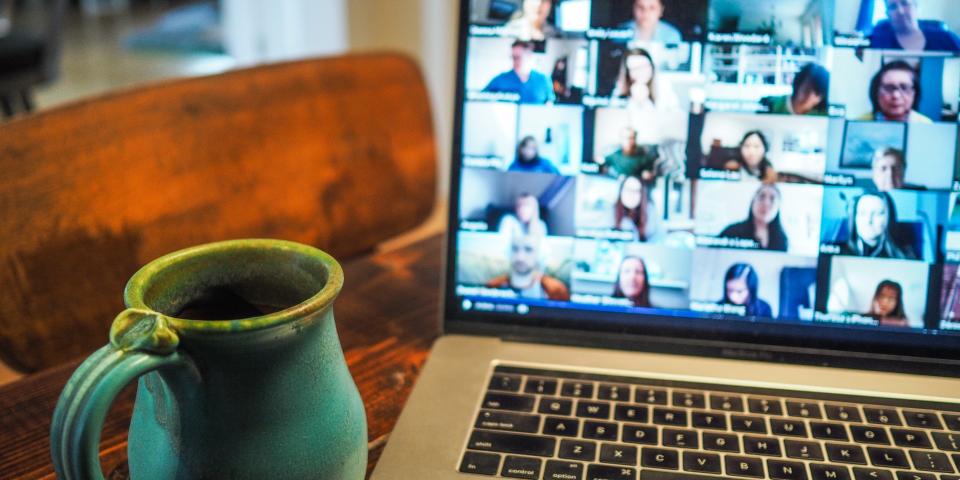 zoom meeting with coffee cup adjacent