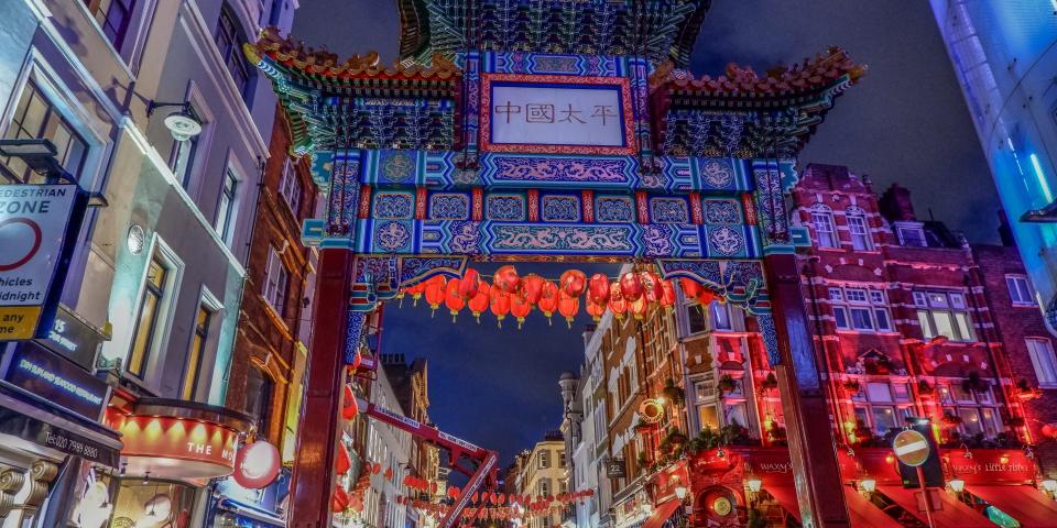 Grand gate at the entrance to London Chinatown at night