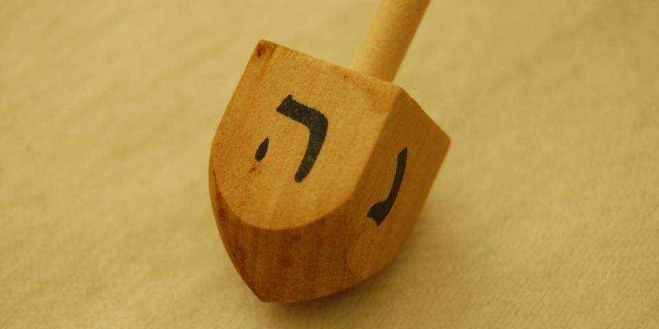 A wooden dreidel