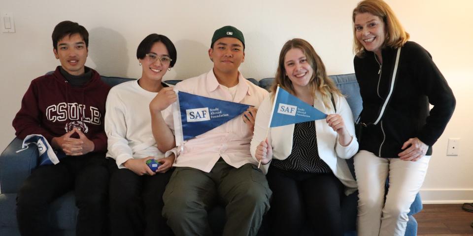 Program specialist Kelly O'Hanlon visits with newly arrived SAF students in Long Beach, California